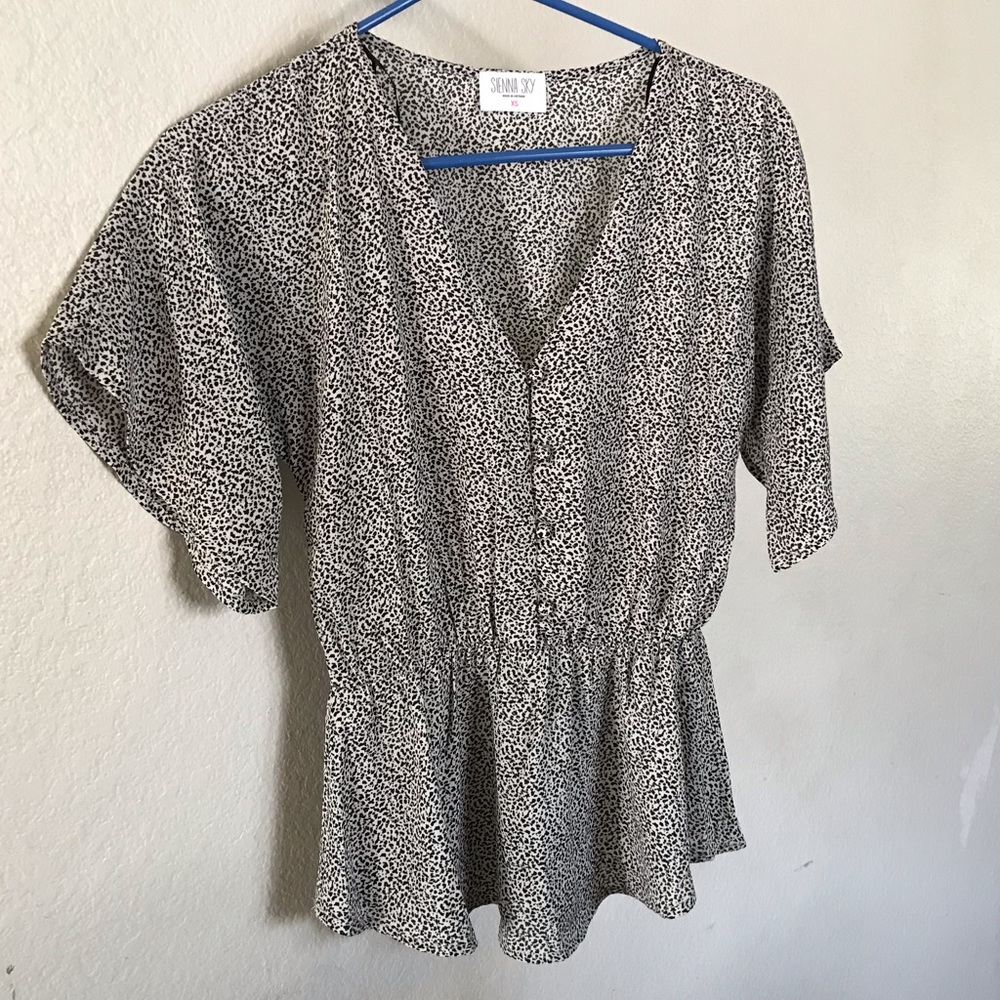 Peplum style short sleeve blouse